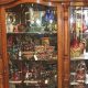 Displaying Elegance: Vintage Curio Cabinet, Curved Glass Treasures | Vintage Treasures: Discover Rare Antiques, Collectibles & Retro Finds